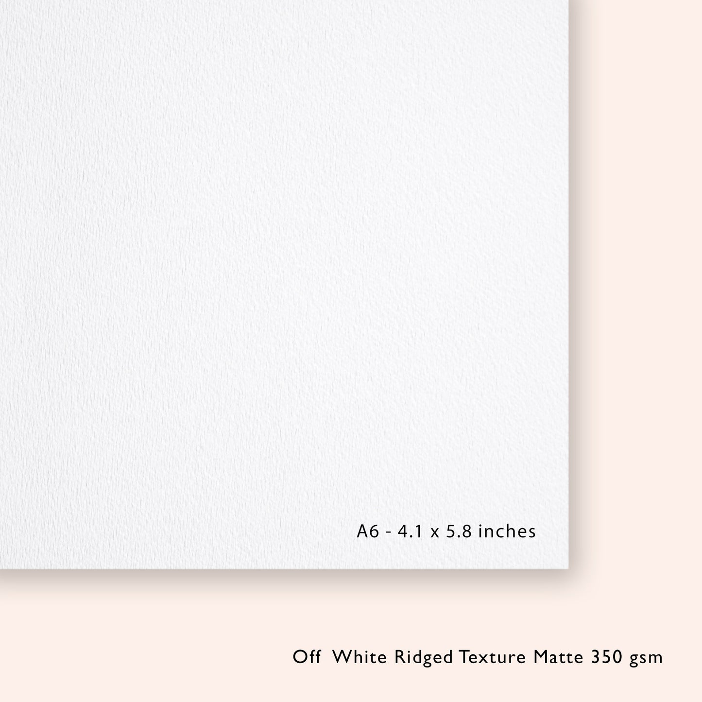 Off-white paper with text indicating size, texture, and weight on a white background