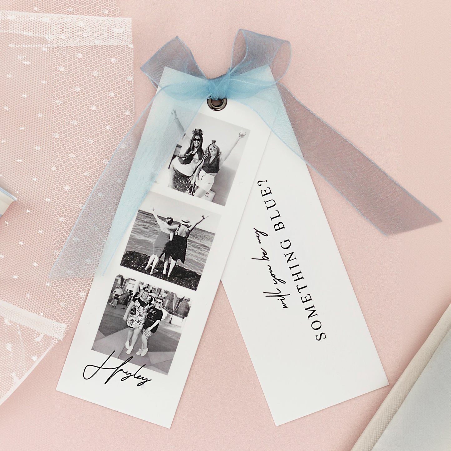 Luxury 'Something Blue' proposal card with blue ribbon, photo strip, and pink background, perfect for bridesmaids.