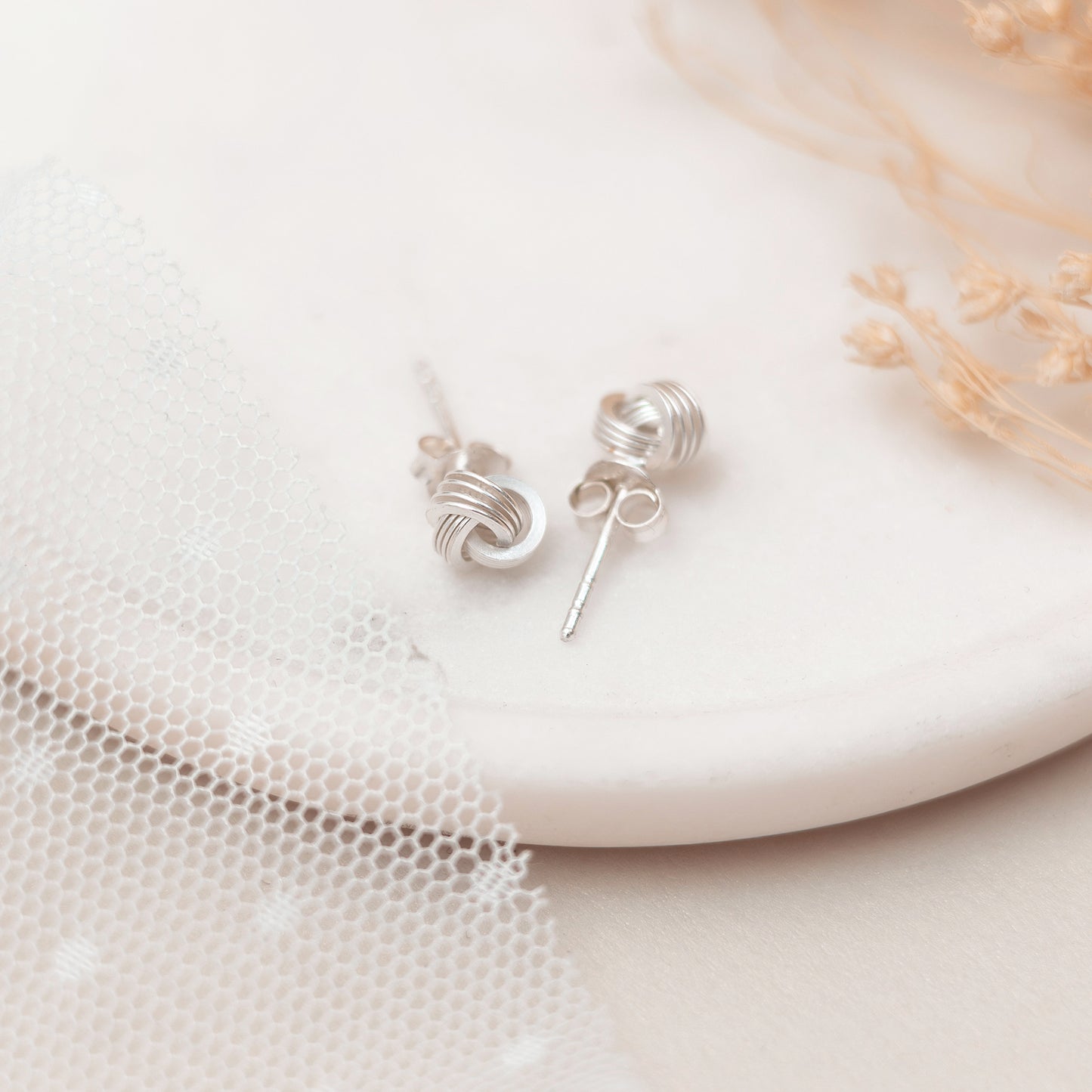 Tie The Knot Silver Earrings