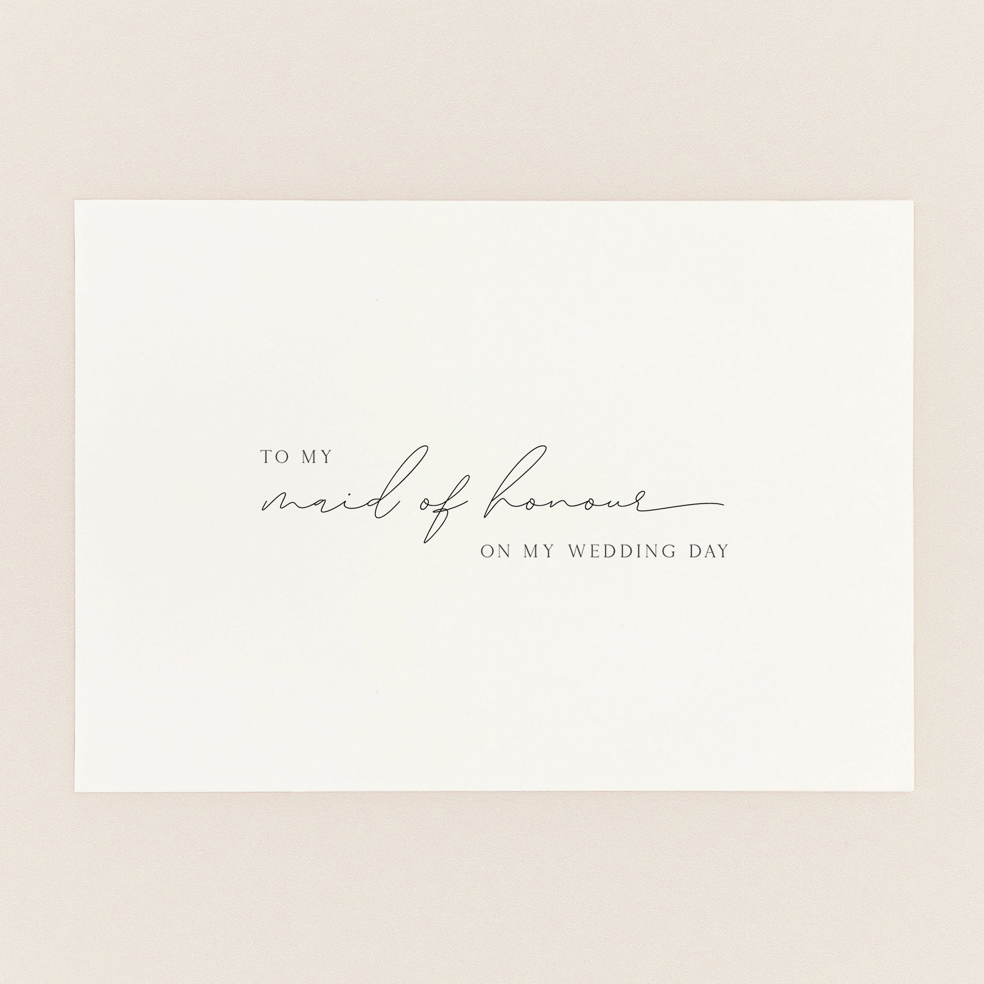 To My Maid of Honour On My Wedding Day card in minimal script typography on cream card stock