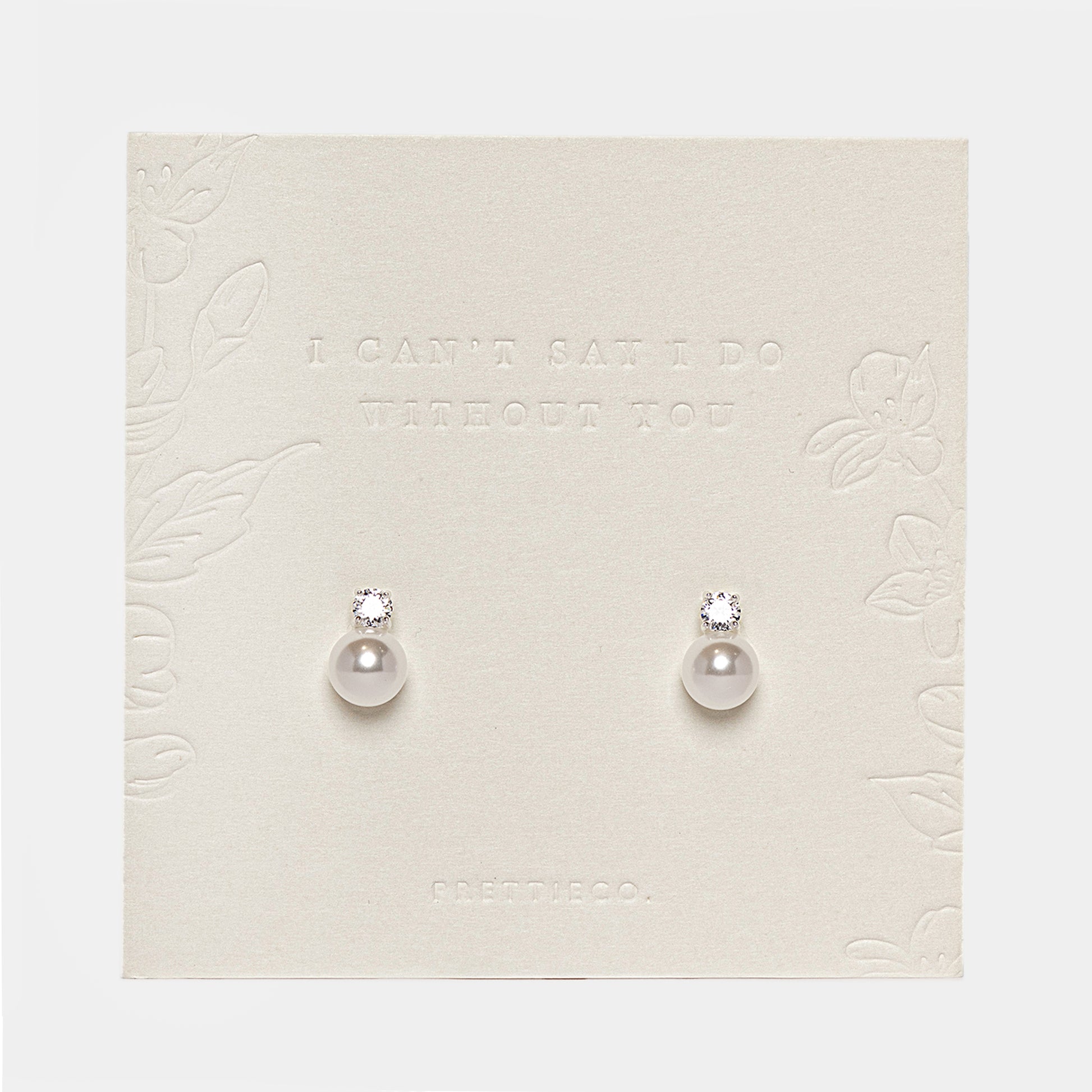Pearl drop stud earrings on embossed PrettieCo backing card